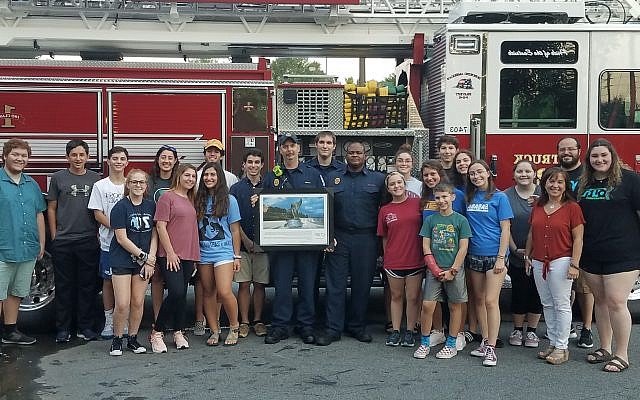 JNF and Etz Chaim’s USY remember 9/11 and present Cobb firefighters with a framed image of Israel’s 9/11 Living Memorial in Jerusalem.