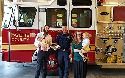 Chabad Rabbi Avrohom Chayempour and his family from Tyrone in South Georgia brought brownies to their local Fayette County fire department.