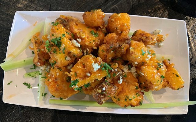 Stellar combination: buffalo spiced cauliflower with celery and blue cheese crumbles.