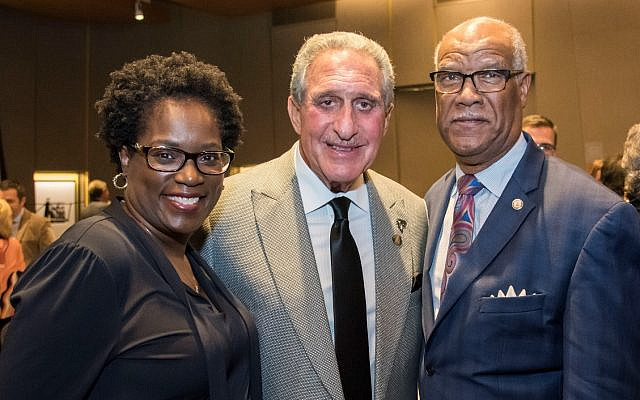 Arthur Blank, center, honored at the Torch of Liberty awards dinner, is pictured here with Antoinette Tuff and Rep. Calvin Smyre.