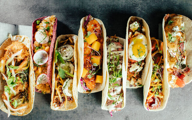 Photo by Velvet Taco // A multi-cultural, globe-trotting row of tacos all made from scratch in-house.
