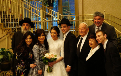 Horvath-Kosman wedding: Dad Stephen “Tzvi” Horvath; Yael Gutman, sister of the bride; mom Junko “Rivka” Horvath; bride Adina Kosman; groom Lozzi Kosman; Avraham “Al” Horvath (z”l ); Claire Horvath; Meir Yaakov Gutman; and Marc Horvath, top right.