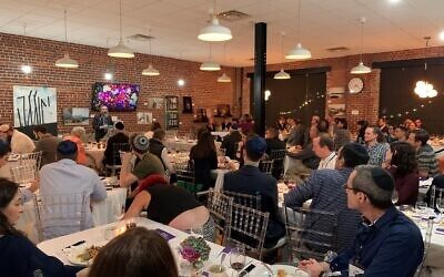 The lower level of Intown Chabad hosted a full 110 for the Babbit presentation.