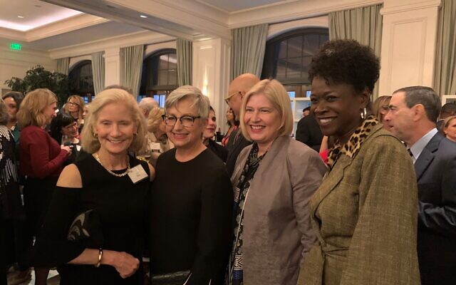 Honoree Carol B. Tomé, second from left, is flanked by Liz Blake and Lee Zack, president of Agnes Scott College, and Danita Knight, vice president of communications for the college.