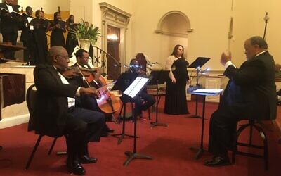 The performance was prepared and conducted by Curtis Everett Powell with guest soloist Elizabeth Birger.