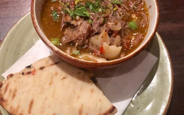 Gypsy Kitchen’s braised lamb with gigante beans, sofrito and grilled pita was very tender.