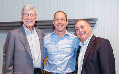 Bernie Marcus gave the commencement address at the graduation in Boca Raton, Fla., which included Geoffrey Menkowitz of Camp Ramah. Both are pictured here with Jeremy Fingerman, CEO of the Foundation for Jewish Camp.