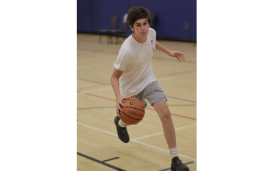 Jaeger Ouanounou, a 14-under basketball player for Team Atlanta, dribbles in practice for the JCC Maccabi Games.