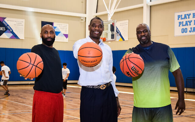 NBA Hall of Famer Dikembe Mutombo, center, will visit the AJA camp. He is pictured here with Kenny Williams, a former NBA player and Israel professional player and Rodney Zimmerman, a former UCLA and NBA player.