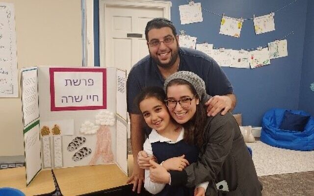 Aderet Afrah showed her parents her presentation on parshah Chayei Sarah.