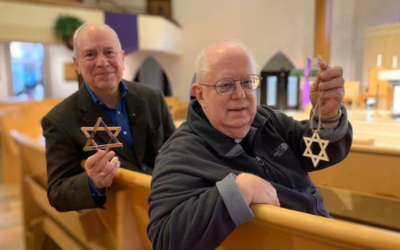 Rabbi Albert Slomovitz, left, partnered with Rev.  Raymond Cadran of the Catholic Church of St. Ann to include a Star of David ornament with every Christmas tree the church sold.