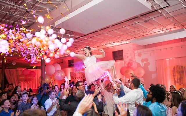 What fun to hoist the bat mitzvah to pop this Balloons Over Atlanta ceiling display!