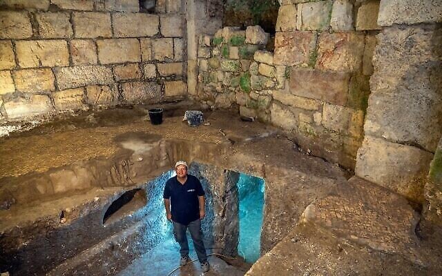 Dr. Barak Monnickendam-Givon at the excavations under Beit Straus in Jerusalem’s Old City, near the Western Wall, May 2020. (Yaniv Berman/Israel Antiquities Authority)