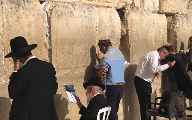 Photos courtesy of Brent Herd //

Brent Herd (center, in the blue shirt) praying at the Kotel three years ago.
