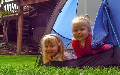 Set up a tent right in your backyard and create a camping experience.
