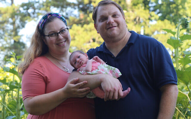 Thea, at 11 days old, enjoys getting outdoors with her parents at Anderson Sunflower Farm.