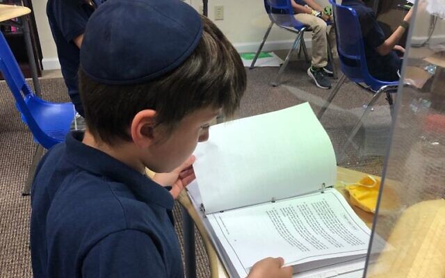 Gilad Livnat studies the laws of the month of Elul.