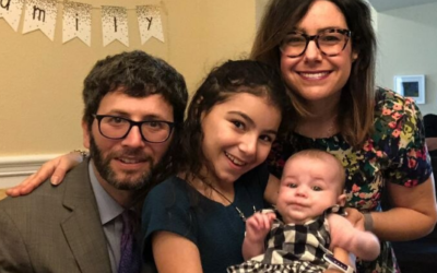 Rabbi Josh Hearshen and his wife Carrie, their 11-year-old daughter Ayelet and new daughter Galit.