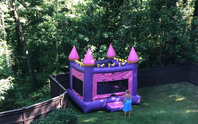 Children enjoyed a princess castle bouncy house.