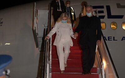 Prime Minister Benjamin Netanyahu and his wife Sara get off the plane at Andrews Air Force Base near Washington, DC, early on September 14, 2020, to sign normalization agreements at a White House ceremony with the United Arab Emirates and Bahrain. (Avi Ohayon / GPO)