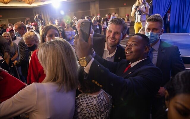 Eric Trump takes a selfie at a rally in support of his father near Hartsfield-Jackson Atlanta International Airport.// AJT Nathan Posner