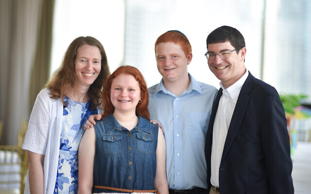 Alan Minsk, right, with his wife Julie, left, and their children Kayla and Matthew.