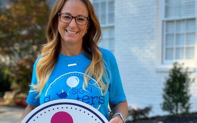 Stacie Francombe, CEO of Sign Greeters, runs the company out of Atlanta