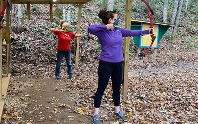 Photo credit Eliana Leader // Small class size allowed for safe individual instruction on the archery range.