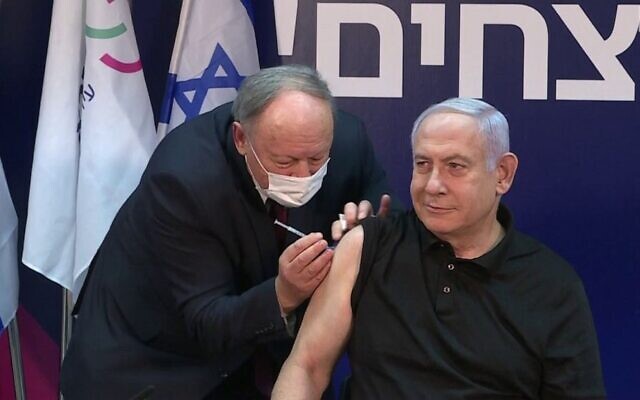 Netanyahu gets the COVID vaccine on Dec. 19.