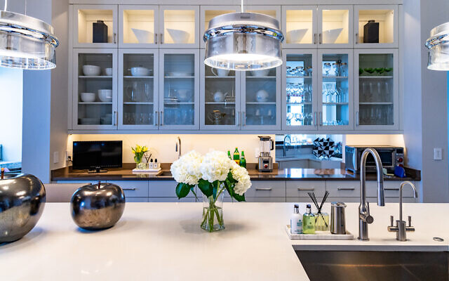 The backsplash is Calacatta Gold marble. The row of Mercury glass fixtures are indeed special.