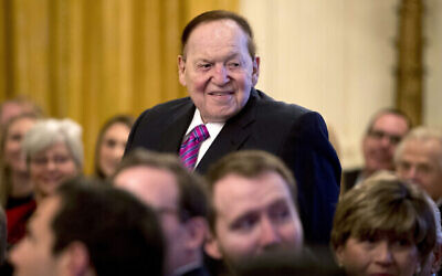 In this Nov. 16, 2018, file photo, Las Vegas Sands Corporation Chief Executive and Republican mega donor Sheldon Adelson, stands as he is recognized by President Donald Trump during a Medal of Freedom ceremony in the East Room of the White House in Washington. (AP Photo/Andrew Harnik, File)