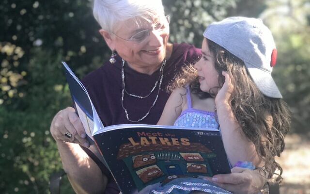 Nana Suellen Katz reads a story to granddaughter Melanie.