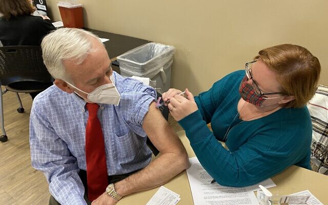 Dr. Stanley Fineman, an allergist and immunologist, received his first dose of the vaccine Dec. 22 and received his second dose Jan. 12 at Kennestone Hospital.