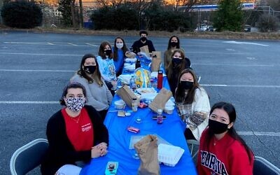 Students participate at an outdoor Shabbat event hosted by UGA Hillel.