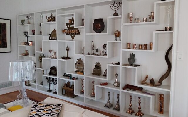 A section of Elihu Siegman and Nancy Sokolove's Judaica collection wall.
