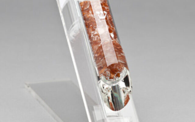 California artist Fay Miller creates a mezuzah with broken glass to fulfill a Fragile bridal registry gift request.