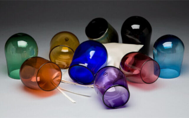 One of these colorful glasses found at Fragile are what a groom breaks at the end of a Jewish wedding ceremony.