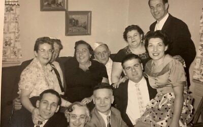 The children of Jacob and Frida Klein and their spouses in the 1950s. 
My father is wearing a white kippah with my mother to his right.