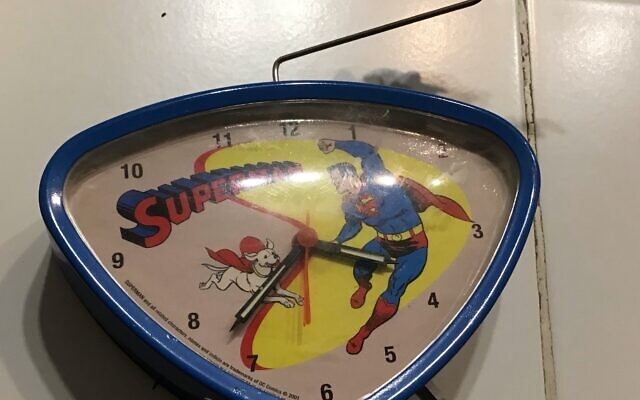 This vintage desk clock’s Superman flies when the alarm sounds.