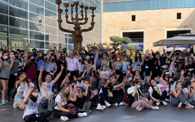 Students are seen outside Ben Gurion Airport after arriving in Israel.