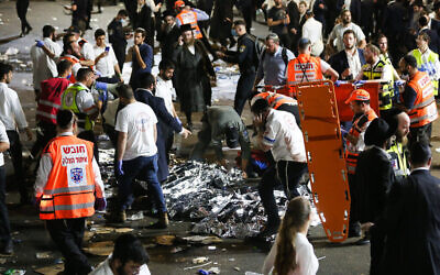 Israeli rescue forces and Police near the scene after a stand collapsed wounding dozends during the celebrations of the Jewish holiday of Lag Baomer on Mt. Meron, in northern Israel on April 30, 2021. Photo by David Cohen/Flash90 *** Local Caption *** ל"ג בעומר
לג בעומר
אסון
קריסה
במה
מתים
אנשים

חסידים
חרדים
חג
הר מרון
הר מירון