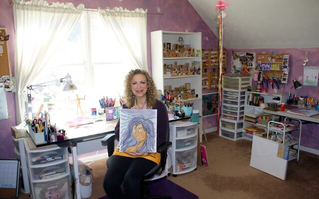 Terry Segal in her art room with colorful pens, pencils, markers, glitter and
empty tea and chocolate canisters repurposed to hold art supplies.