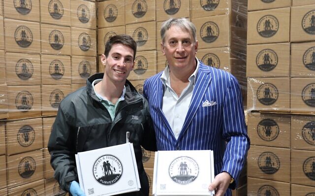 Ben and Kirk Halpern display Farmers & Fishermen Purveyors' delivery boxes at their headquaters.