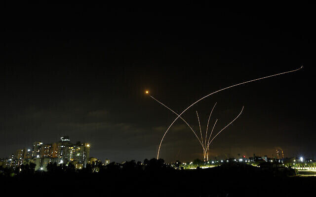 A long exposure picture shows Iron Dome anti-missile system fire as rockets are launched from the Gaza Strip, Ashkelon, May 10, 2021 (Edi Israel/Flash90)