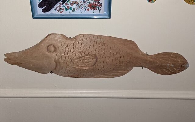 Carved wooden fish.