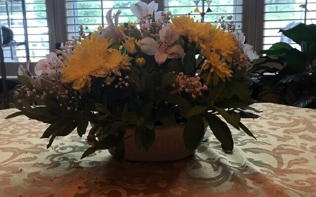 Flowers on the lunch reception table at the home of Genie and Barry Nickelsberg May 16.