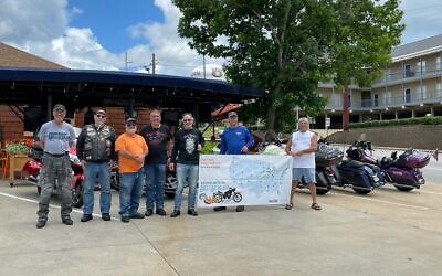 Bikers meet at The General Muir as part of a cross-country “deli schlep” to raise hunger awareness.