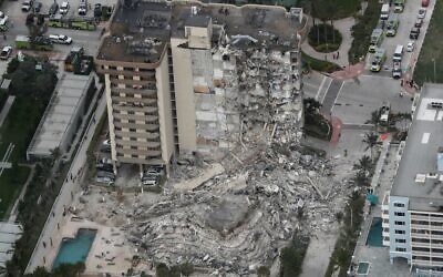 Aerial photo shows part of the 12-story oceanfront Champlain Towers South Condo that collapsed in Surfside, Fla. Photo by Amy Beth Bennett/South Florida Sun-Sentinel via AP