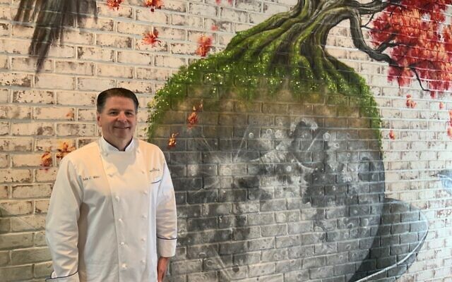 Chef John Metz continues to operate the successful Marlow's Tavern location, and the recently-opened The Woodall.