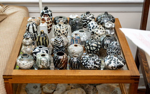 Photo by Howard Mendel Photography  // Cohen created these black-and-white vessels on display in the living room